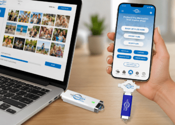 Hands plugging a PhotoStick OMNI into a modern smartphone for photo backup