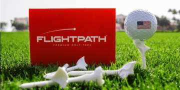 FlightPath golf tee set up on the tee box before a driver swing.