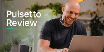 Honest Pulsetto Review: Does This Vagus Nerve Stimulator Actually Work? 10 Professional woman wearing Pulsetto vagus nerve stimulator for stress relief at work